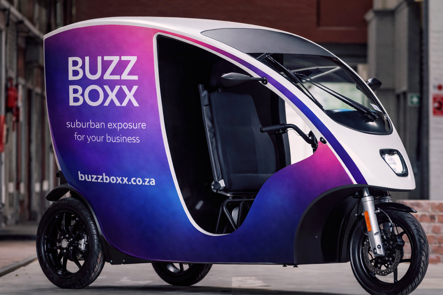 BuzzBoxx branded three wheeler vehicle